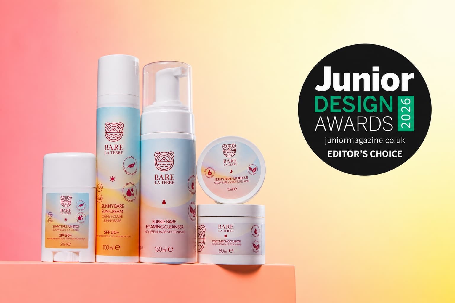 The Bare la Terre range on a coral plinth beside the black Junior Design Awards 2026 Editor’s Choice badge